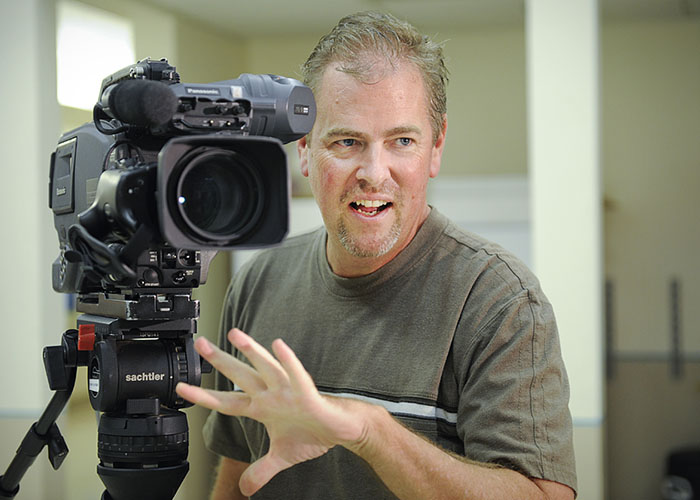 AF civilian with video camera